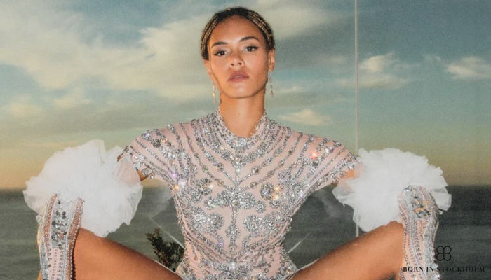 a woman at electric daisy carnival with an outfit and guide