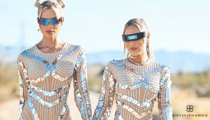 two women walking at lightning in a bottle festival